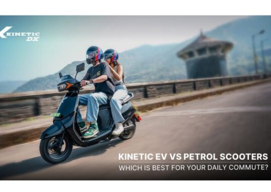 Couple riding a Kinetic DX electric scooter on a highway representing electric scooter vs petrol scooter comparison